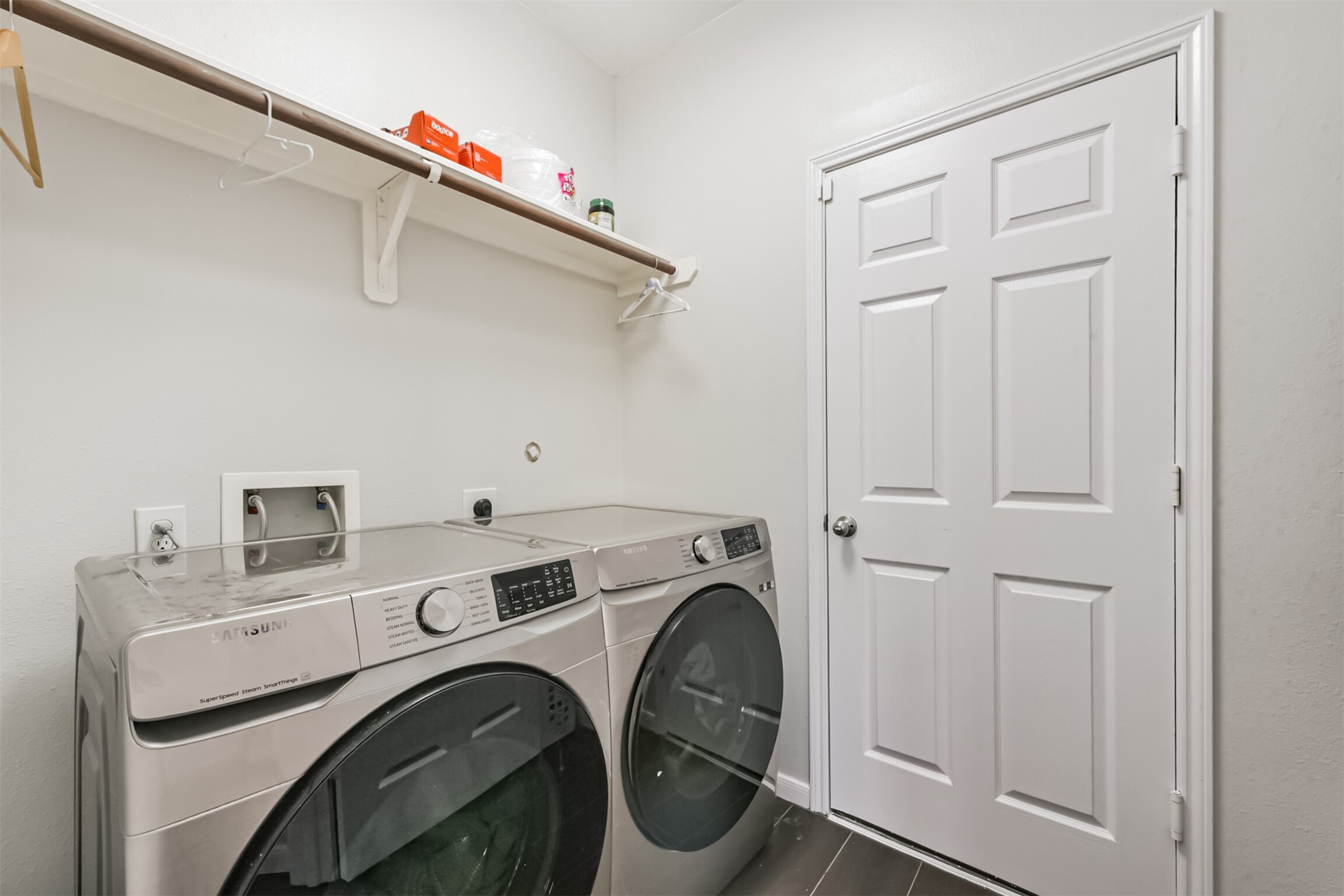 6806 Russelfield Lane Houston, TX 77049 - Photo 42 of 46 a utility room with dryer and washer