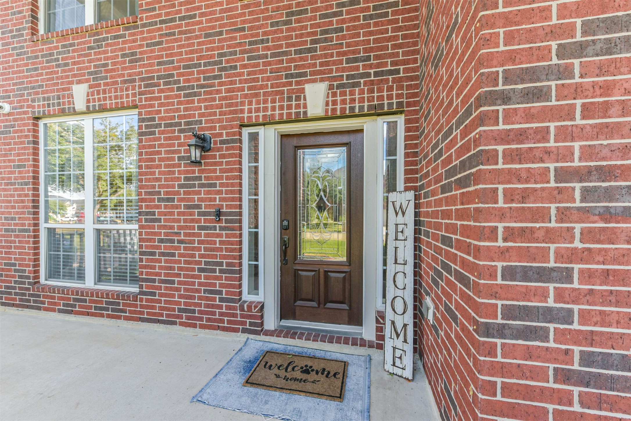 6806 Russelfield Lane Houston, TX 77049 - Photo 6 of 46 a view of a brick wall with a window