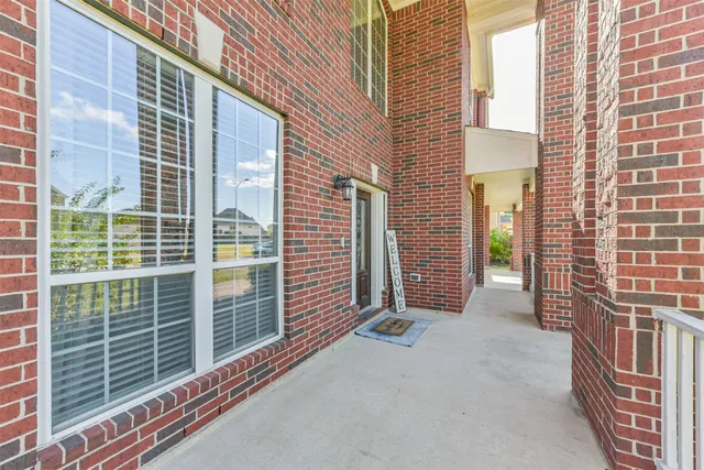 a bathroom with a sink mirror vanity and toilet