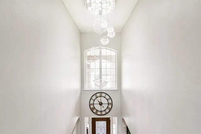a bathroom with a sink vanity tub and a mirror