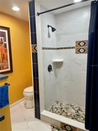 a bathroom with a sink and a shower
