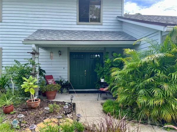 a view of a entryway door front of house