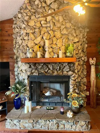 a fireplace with wooden floor