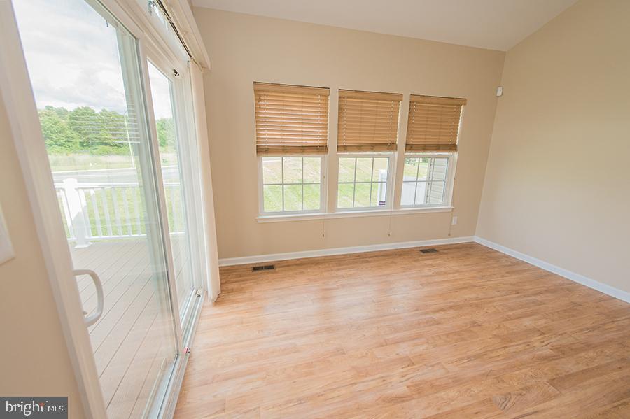 1406 Cat Tail Court Salisbury, MD 21804 - Photo 14 of 68 a view of an empty room with a window