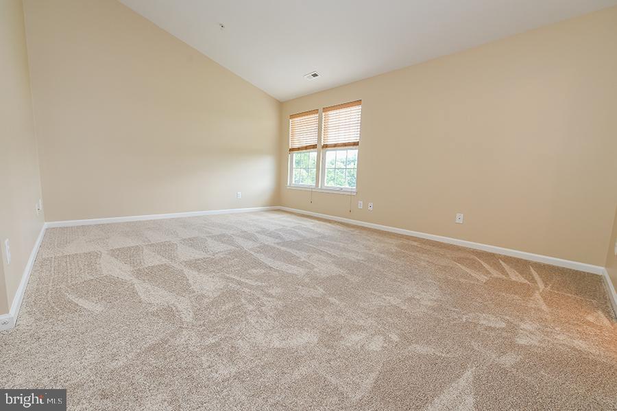 1406 Cat Tail Court Salisbury, MD 21804 - Photo 34 of 68 an empty room with windows