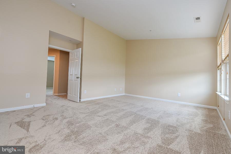 1406 Cat Tail Court Salisbury, MD 21804 - Photo 35 of 68 a view of an empty room with a window