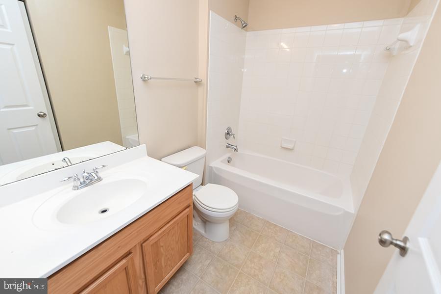 1406 Cat Tail Court Salisbury, MD 21804 - Photo 49 of 68 a bathroom with a sink a toilet and shower