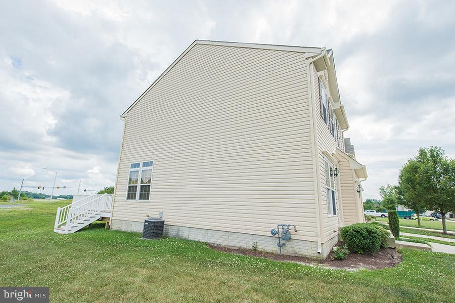 1406 Cat Tail Court Salisbury, MD 21804 - Photo 57 of 68 a view of a backyard with plants and a garden