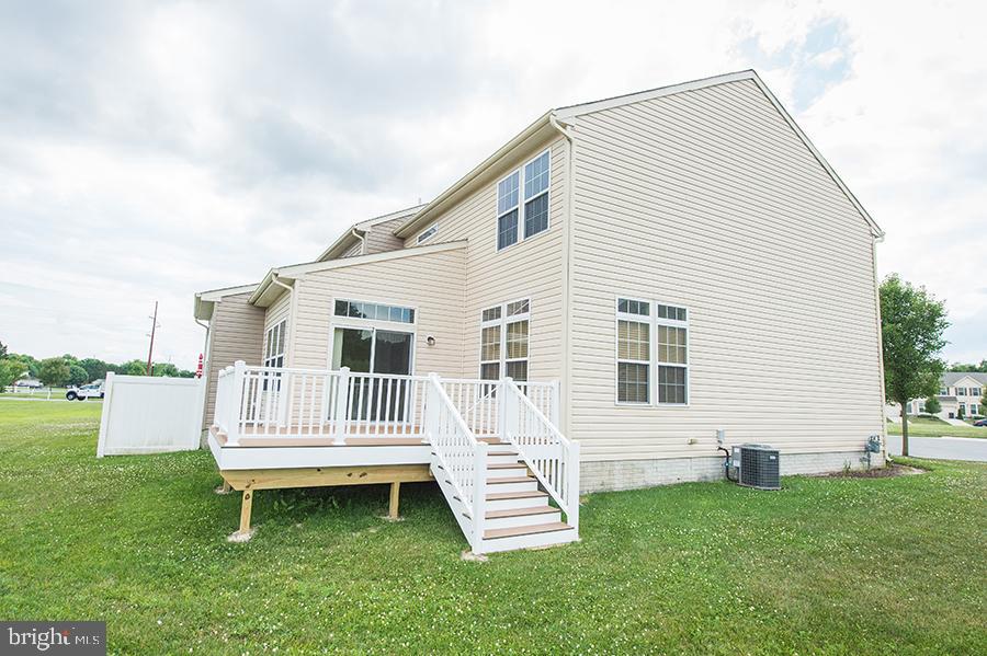 1406 Cat Tail Court Salisbury, MD 21804 - Photo 58 of 68 a front view of a house with a garden