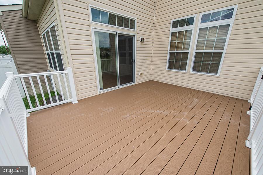 1406 Cat Tail Court Salisbury, MD 21804 - Photo 62 of 68 a view of backyard with deck and large window