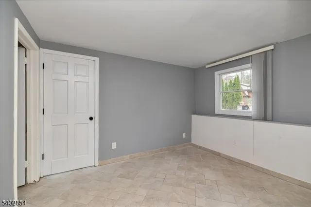 a view of an empty room with window