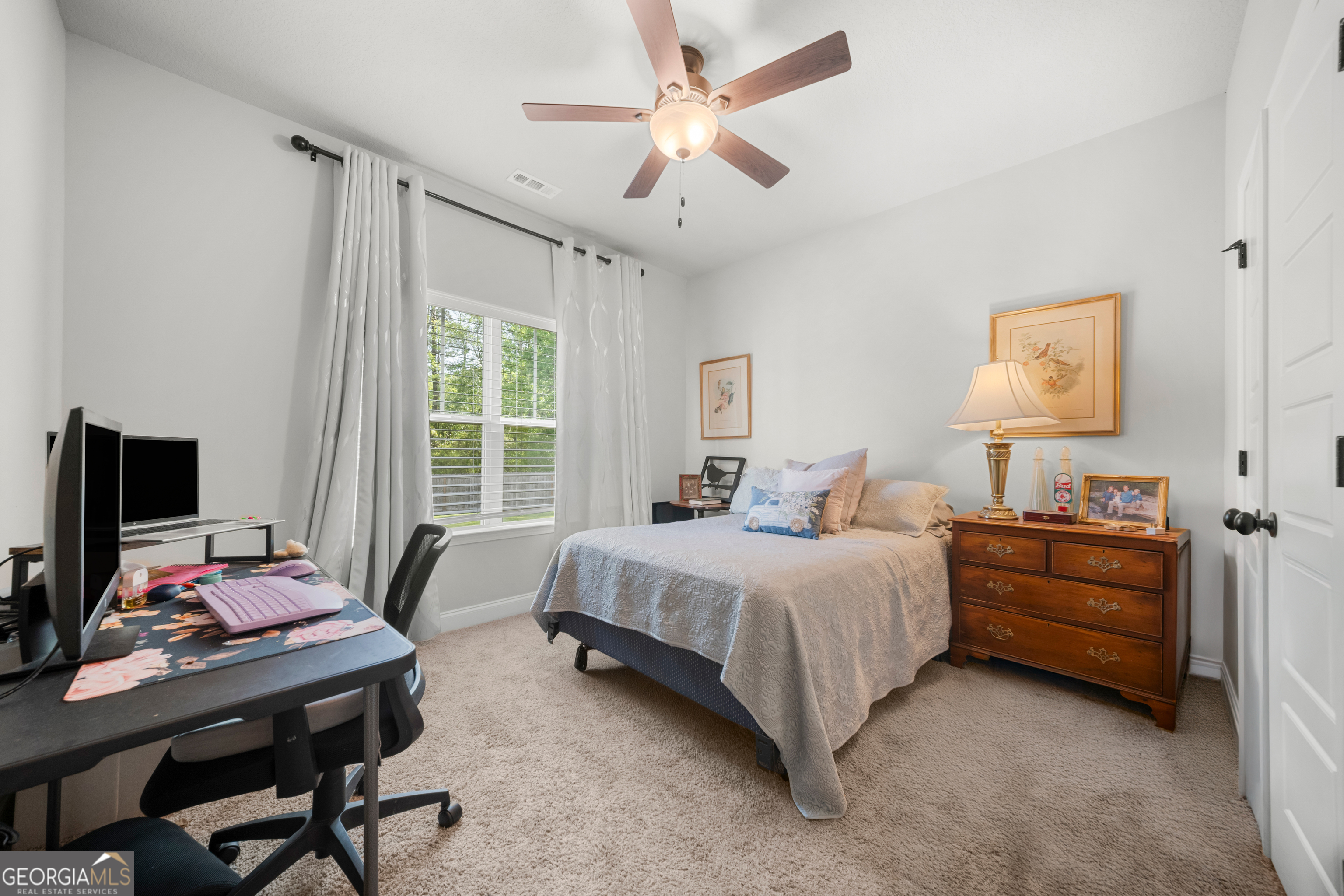 401 Elwick Place Statesboro, GA 30461 - Photo 12 of 36 a bedroom with a bed and a window