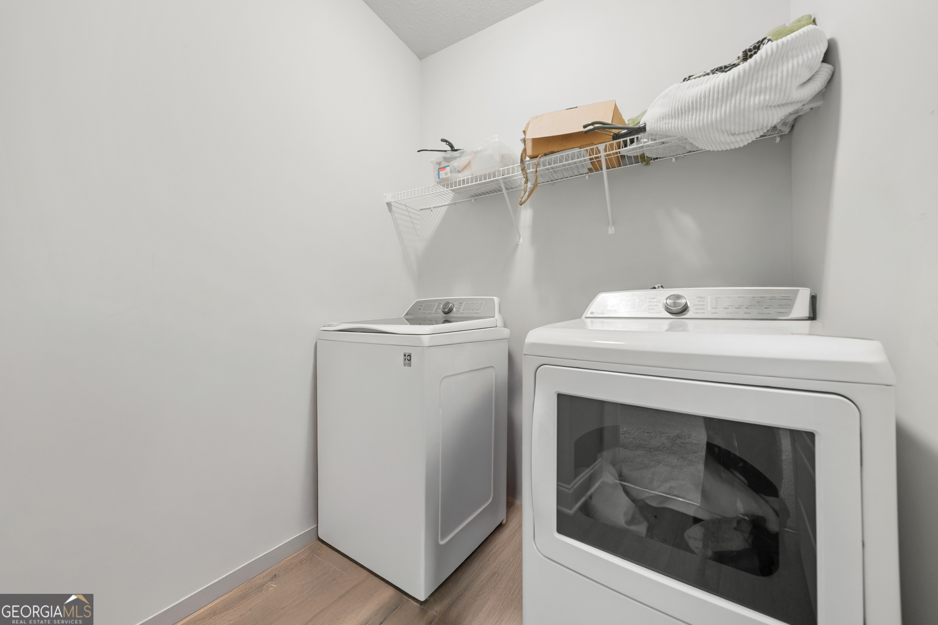 401 Elwick Place Statesboro, GA 30461 - Photo 19 of 36 a utility room with dryer and washer