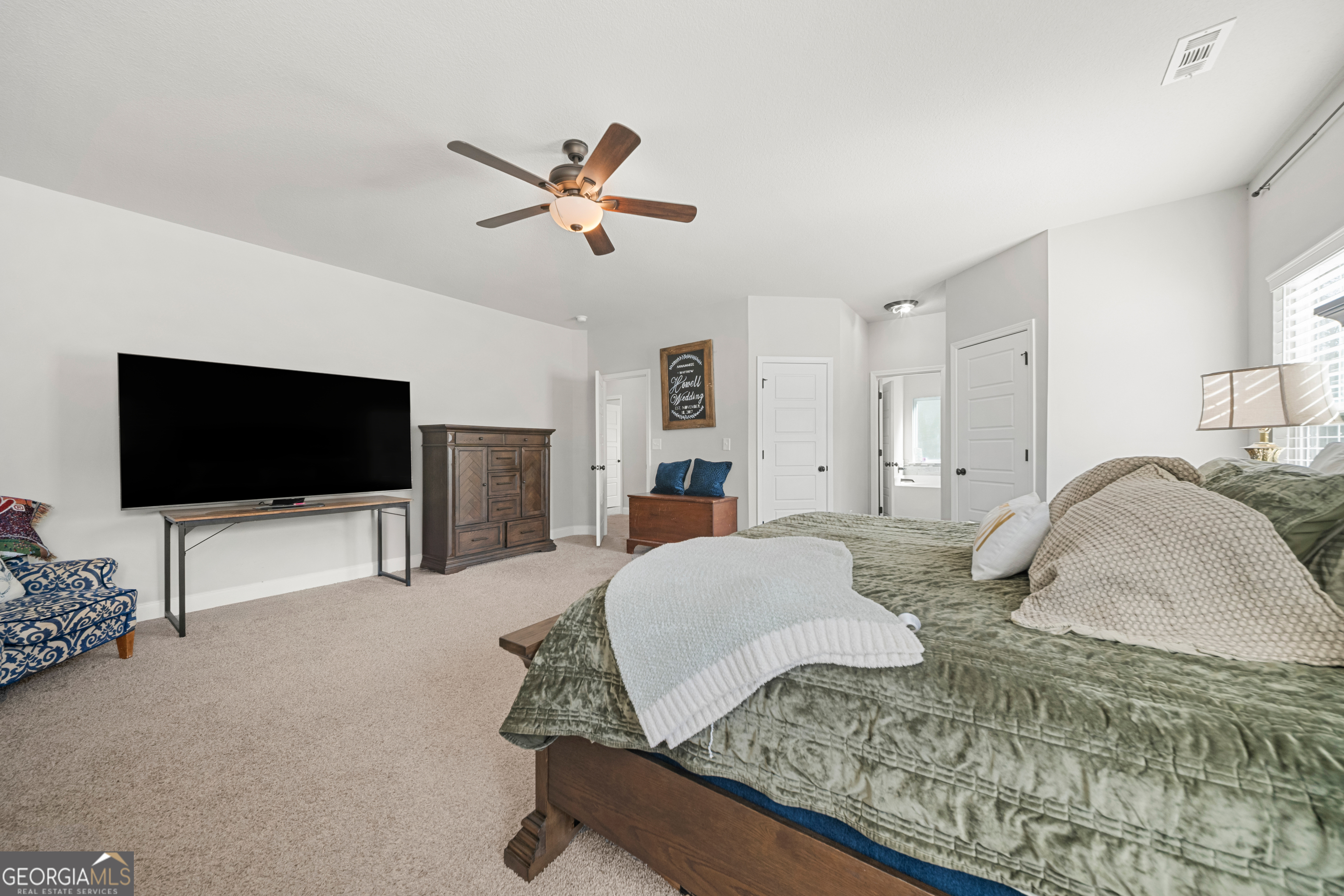 401 Elwick Place Statesboro, GA 30461 - Photo 20 of 36 a living room with furniture and a flat screen tv