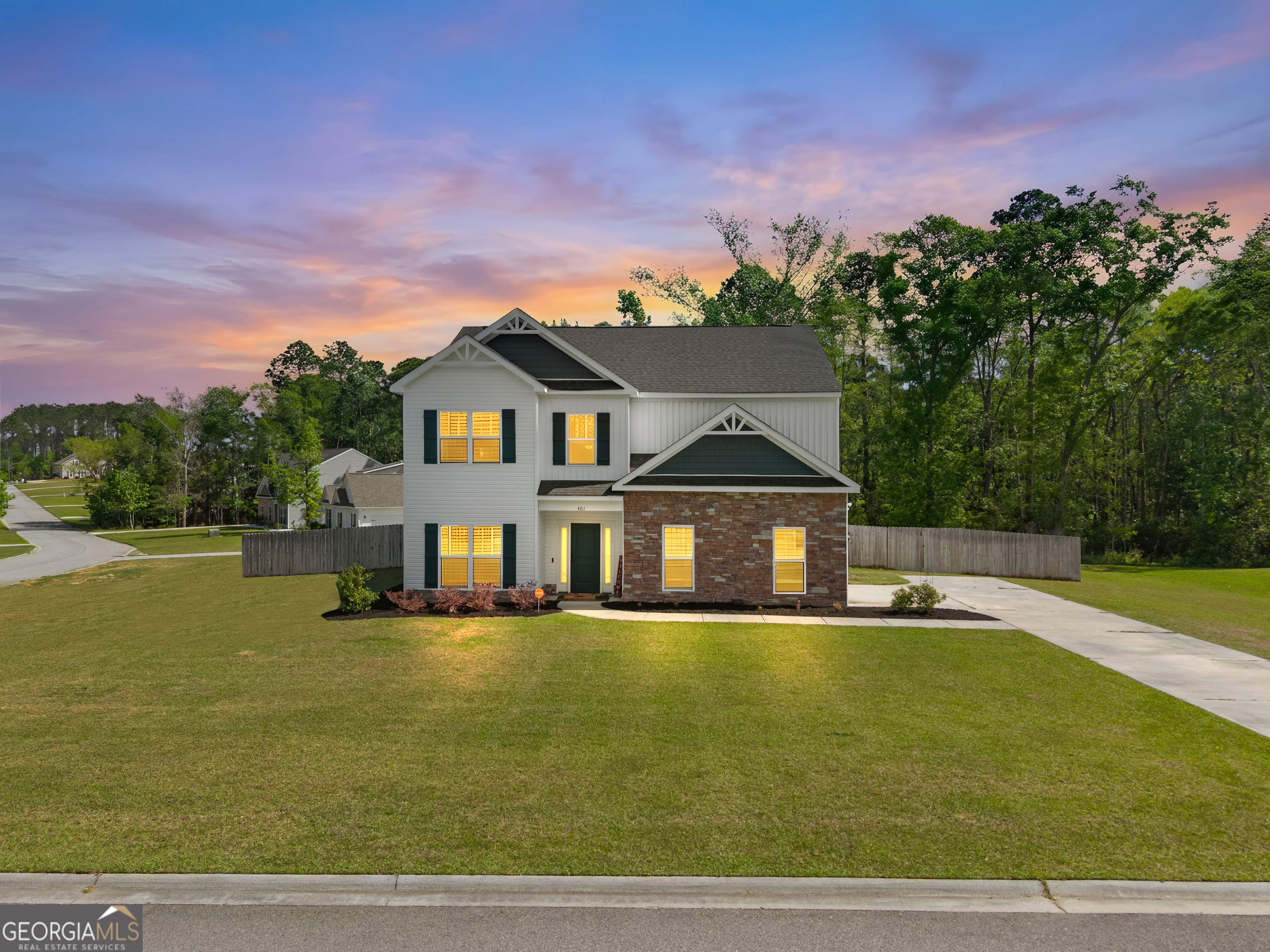 401 Elwick Place Statesboro, GA 30461 - Photo 2 of 36 a view of a house with a big yard