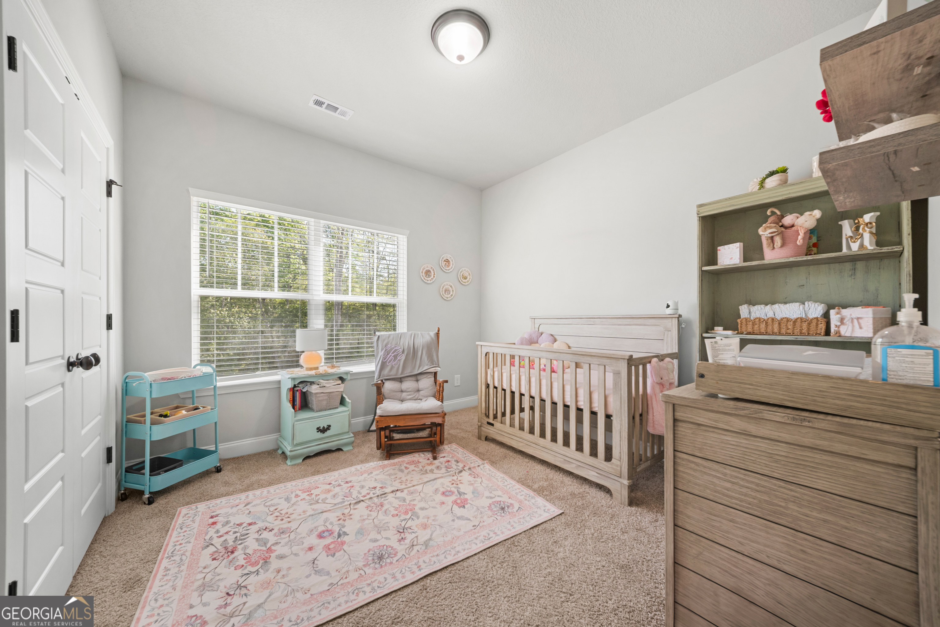 401 Elwick Place Statesboro, GA 30461 - Photo 23 of 36 a bedroom with furniture and a large window