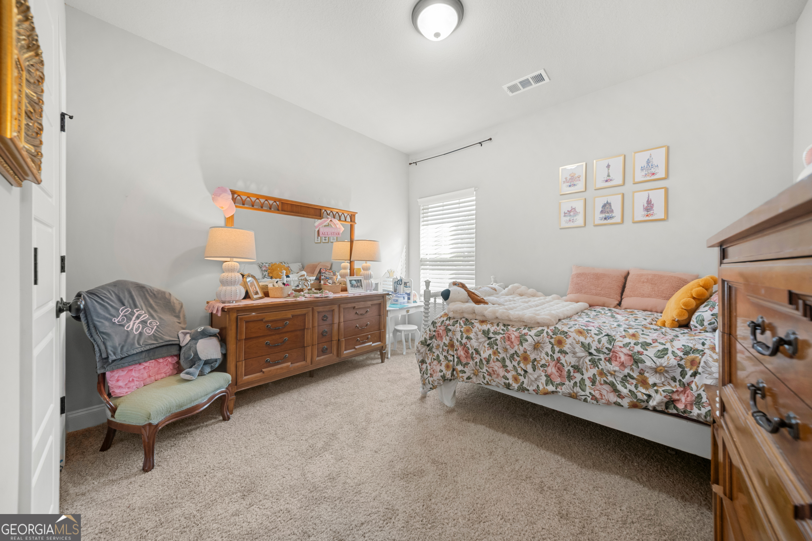 401 Elwick Place Statesboro, GA 30461 - Photo 24 of 36 a bedroom with a bed and a couch