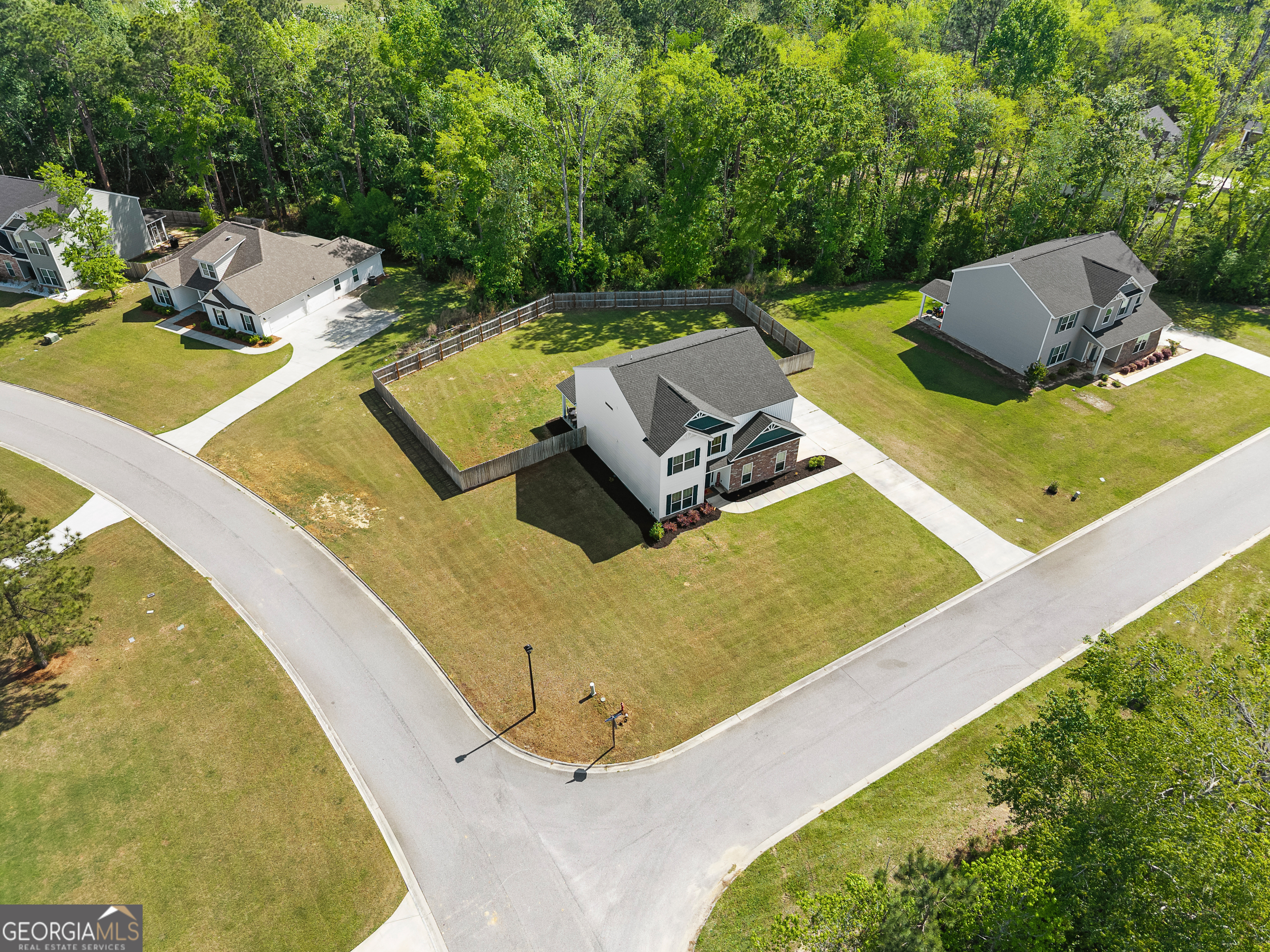 401 Elwick Place Statesboro, GA 30461 - Photo 30 of 36 a view of a swimming pool with a yard