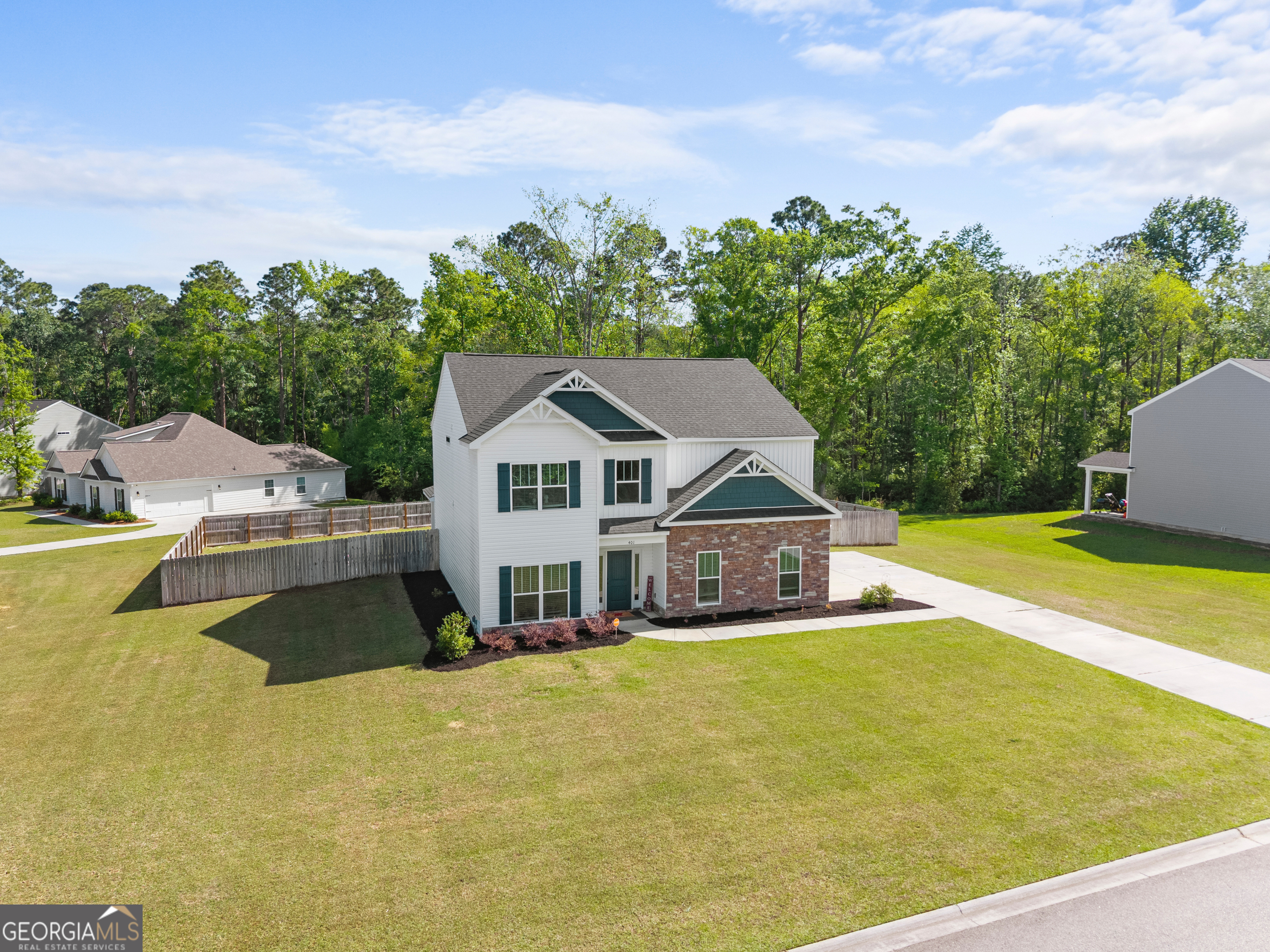401 Elwick Place Statesboro, GA 30461 - Photo 33 of 36 a view of a house with a big yard