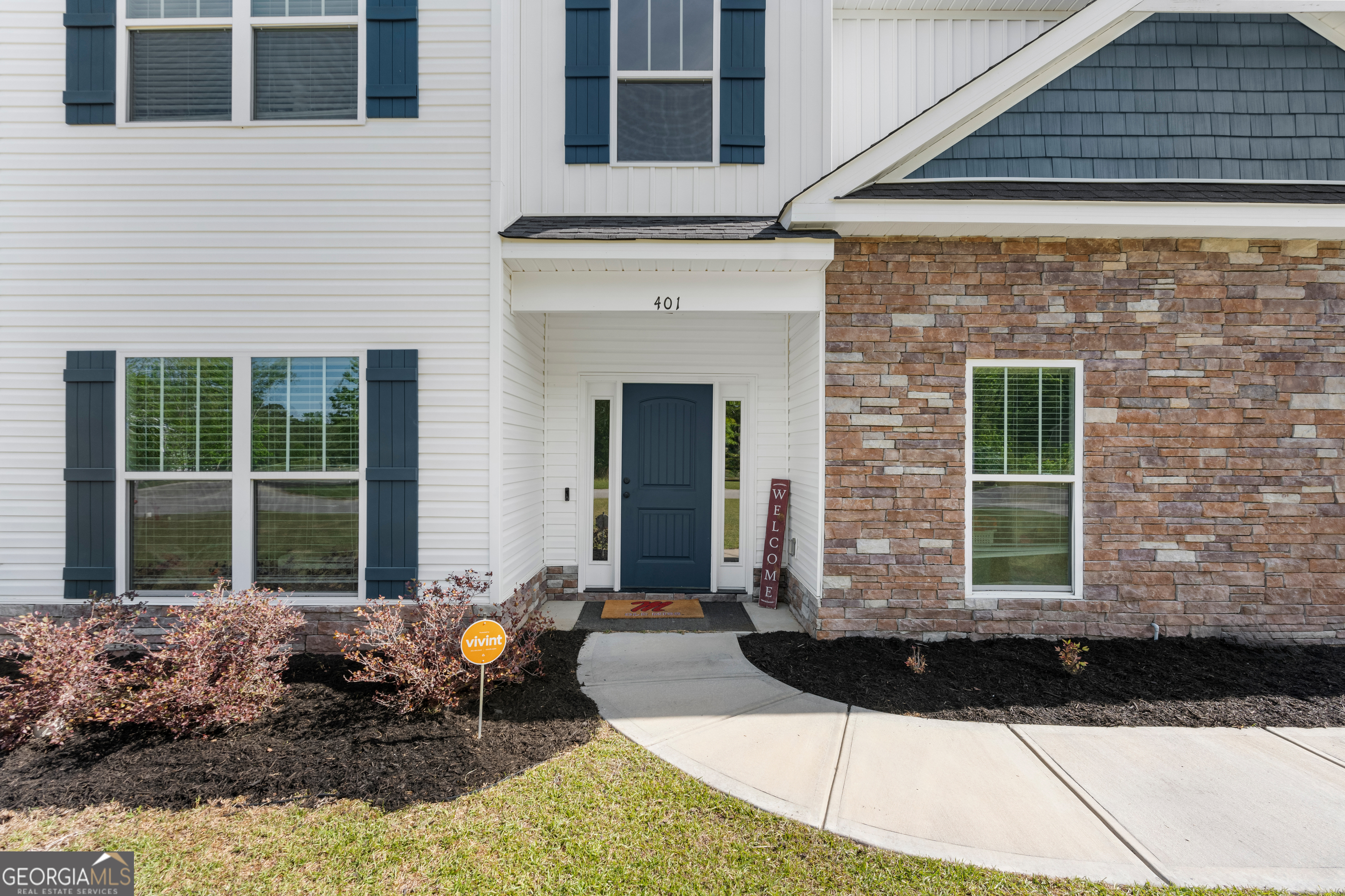 401 Elwick Place Statesboro, GA 30461 - Photo 4 of 36 a front view of a house with a yard