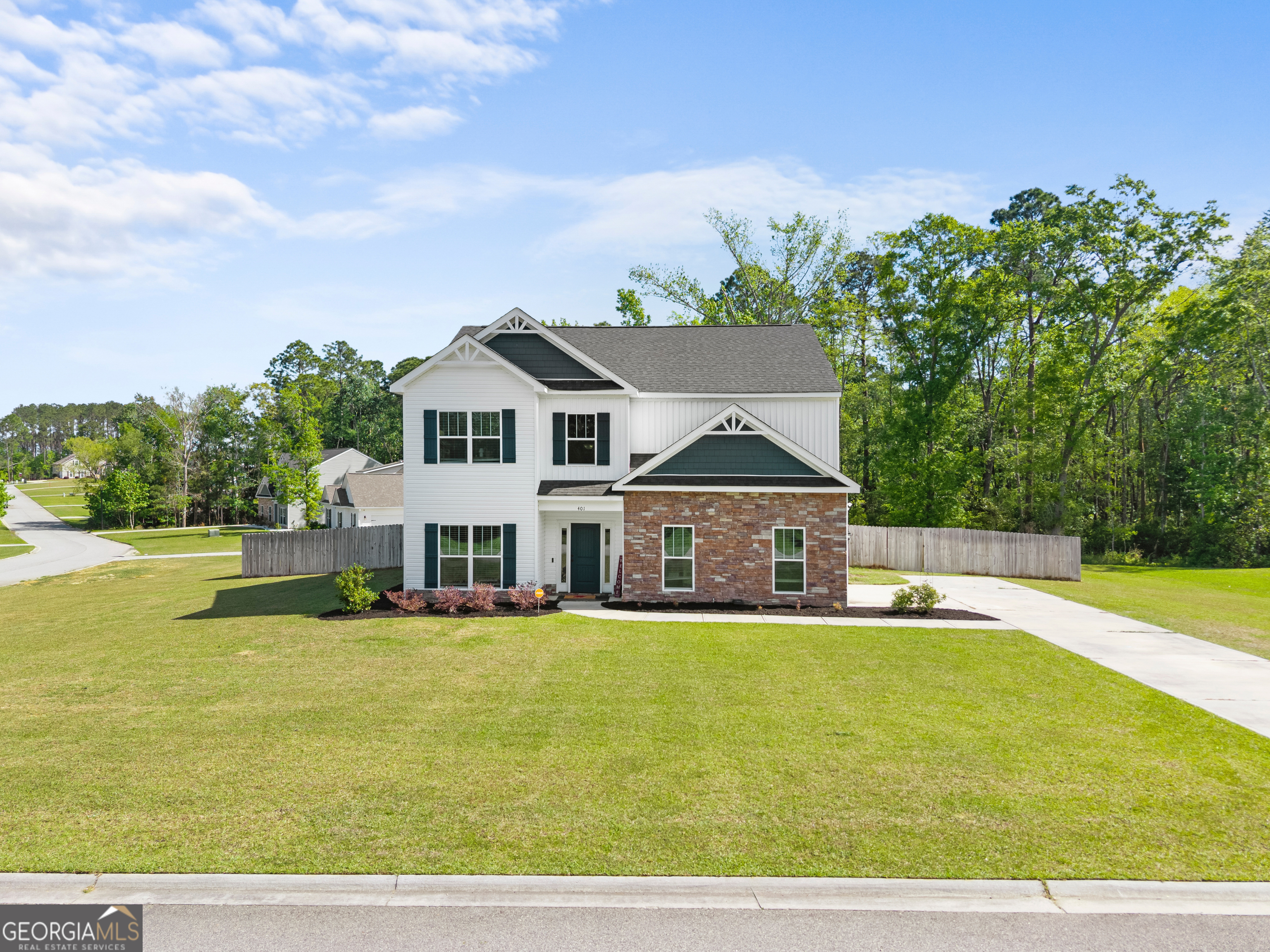 401 Elwick Place Statesboro, GA 30461 - Photo 5 of 36 a view of a house with a big yard