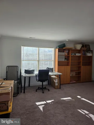 a view of a livingroom with furniture