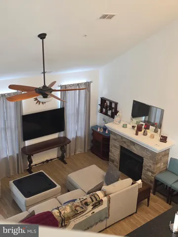 a room with furniture and a flat screen tv