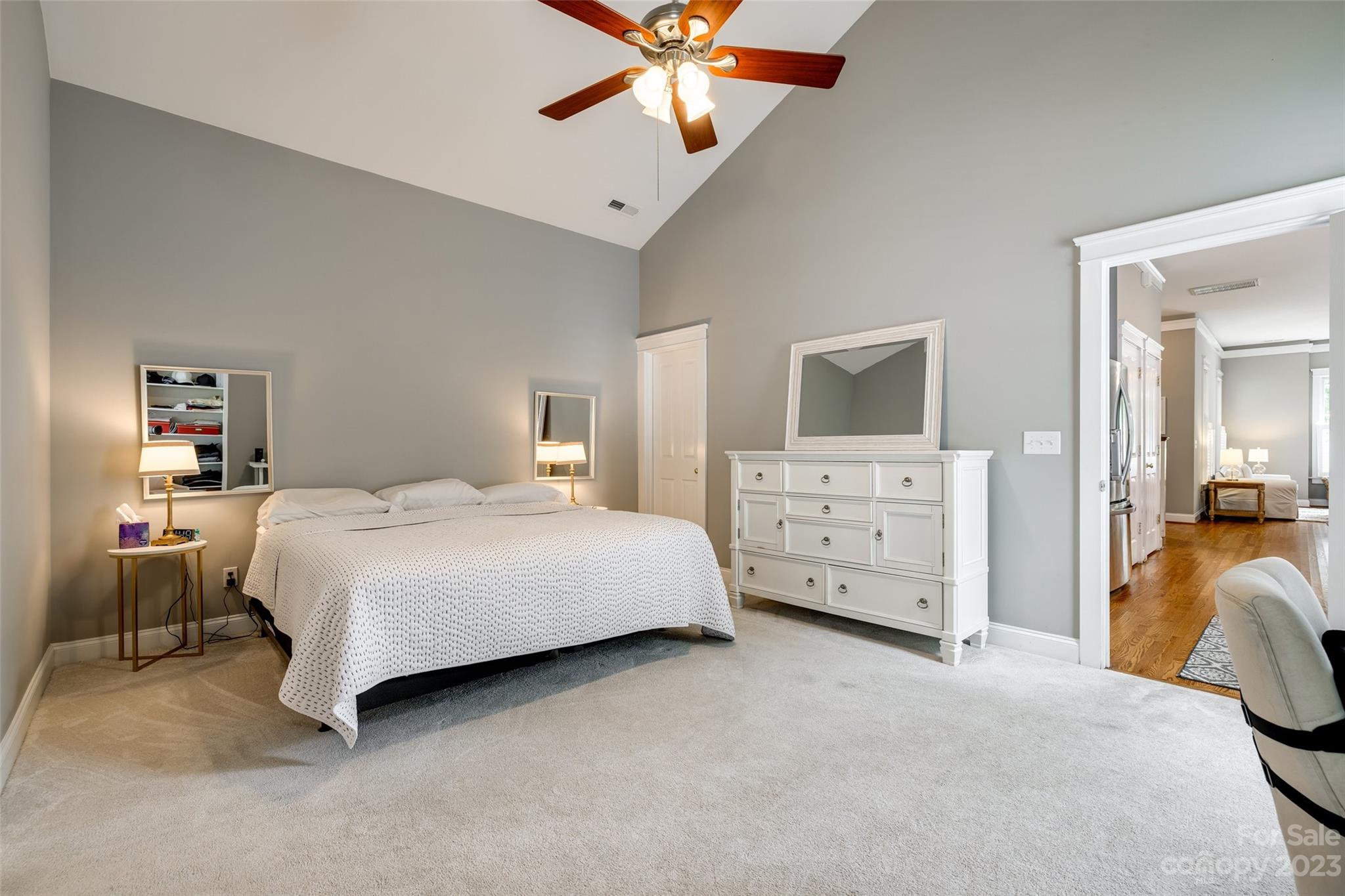 3292 Richard's Crossing Fort Mill, SC 29708 - Photo 19 of 39 a bedroom with a bed and a chandelier