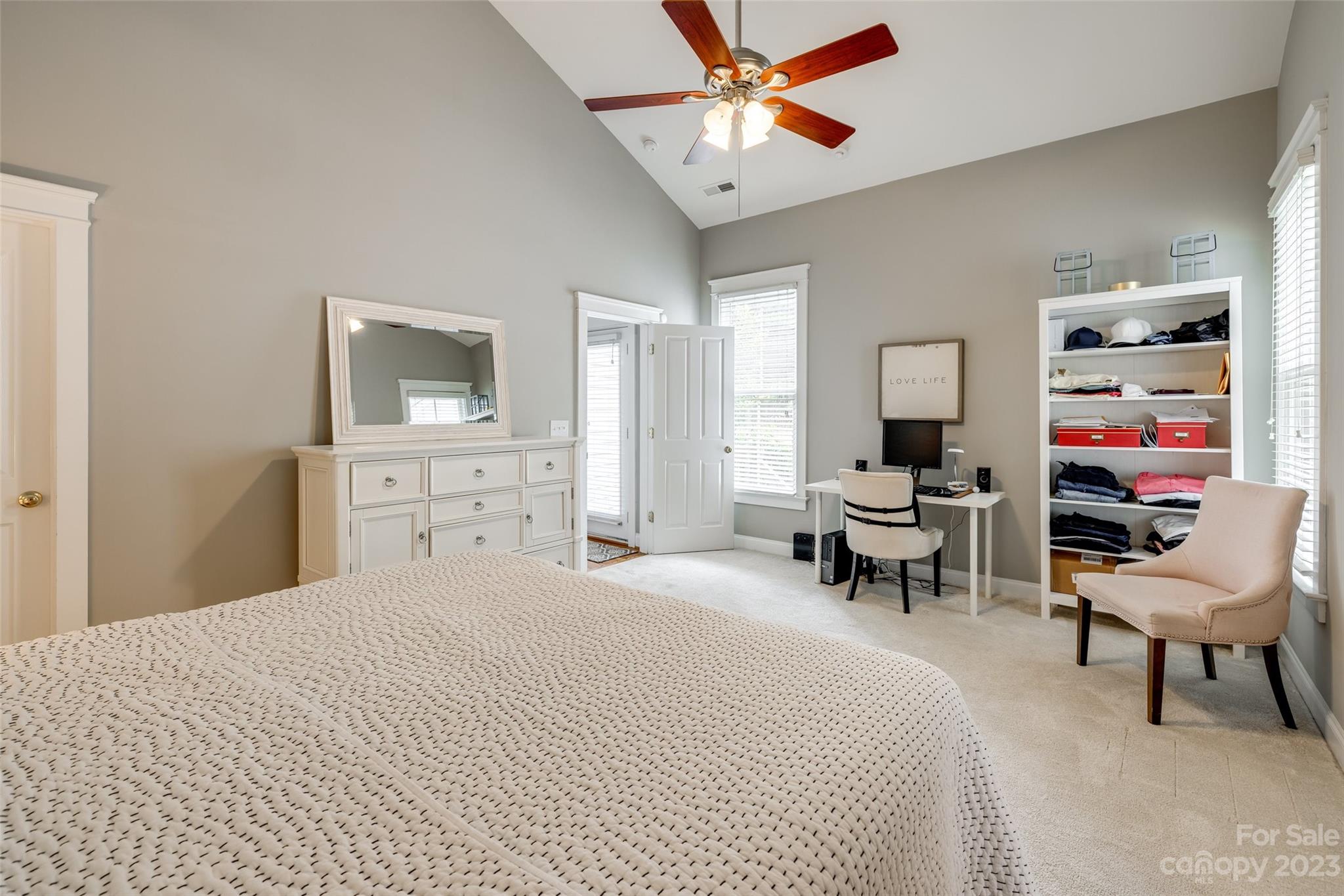 3292 Richard's Crossing Fort Mill, SC 29708 - Photo 20 of 39 a bedroom with a bed and a chandelier