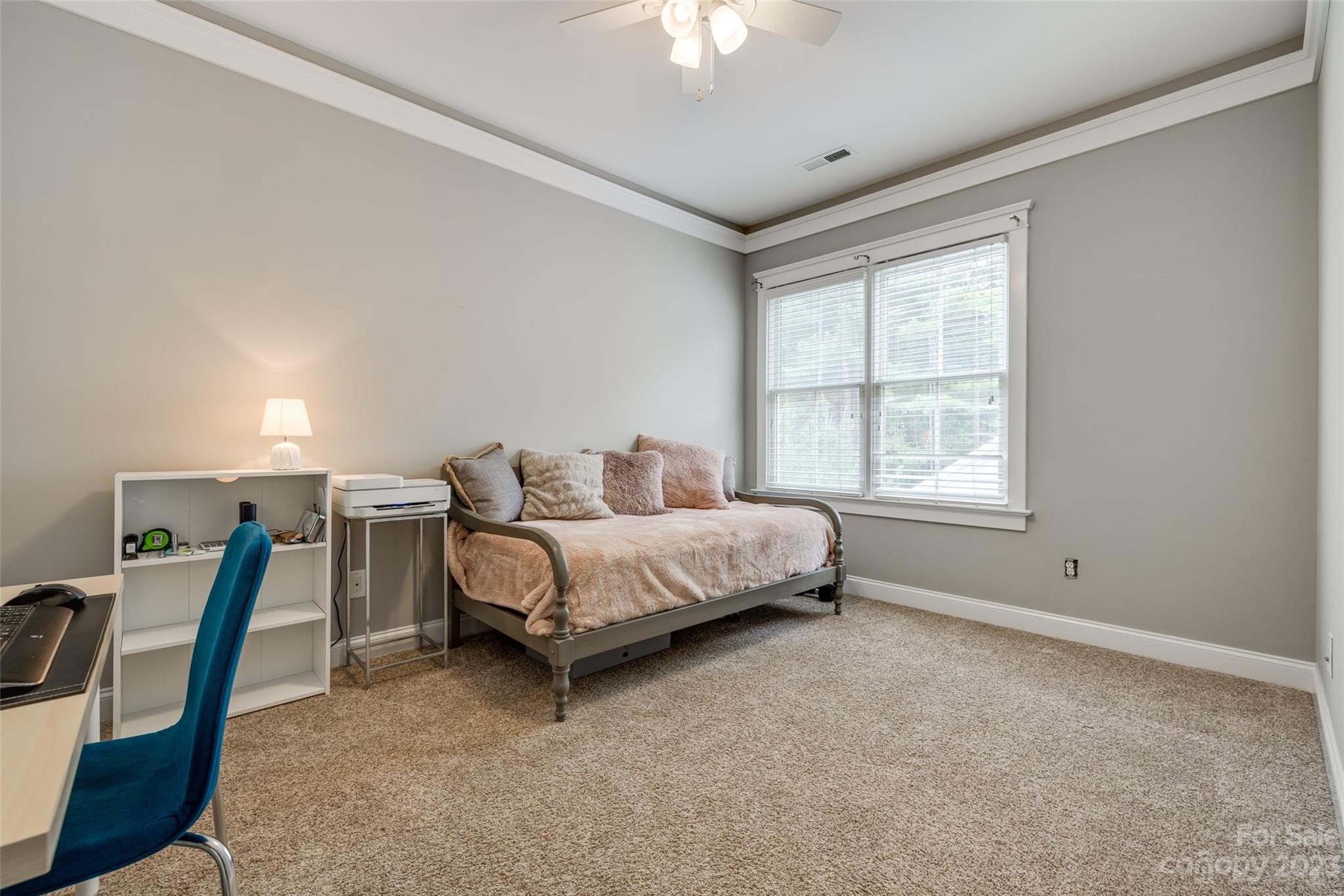 3292 Richard's Crossing Fort Mill, SC 29708 - Photo 27 of 39 a spacious bedroom with a bed and a chandelier