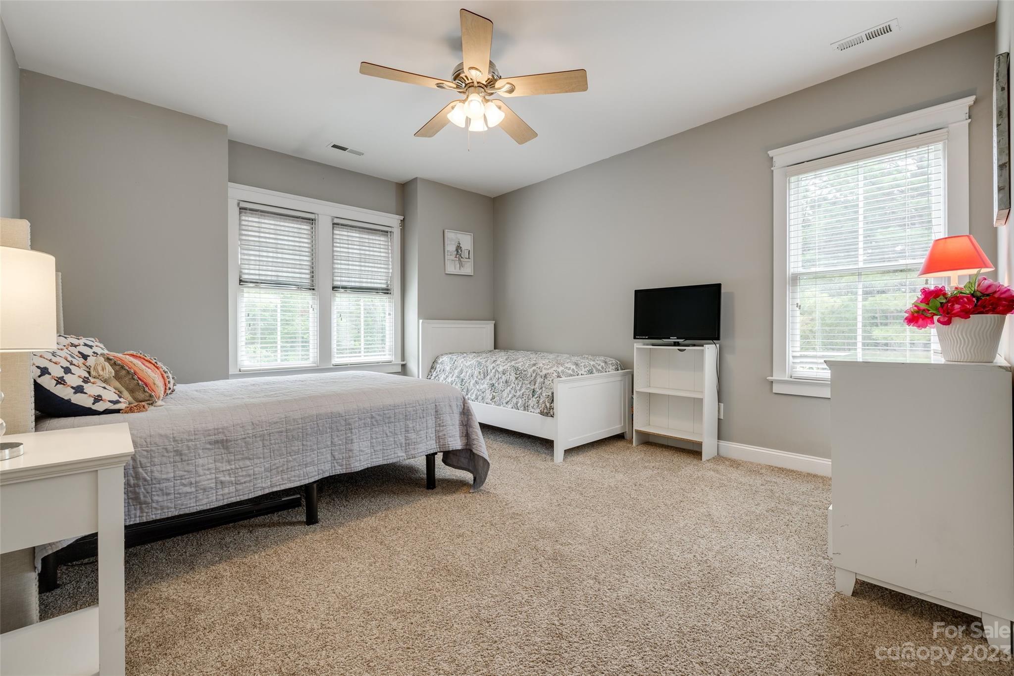 3292 Richard's Crossing Fort Mill, SC 29708 - Photo 29 of 39 a bedroom with bed and a chandelier