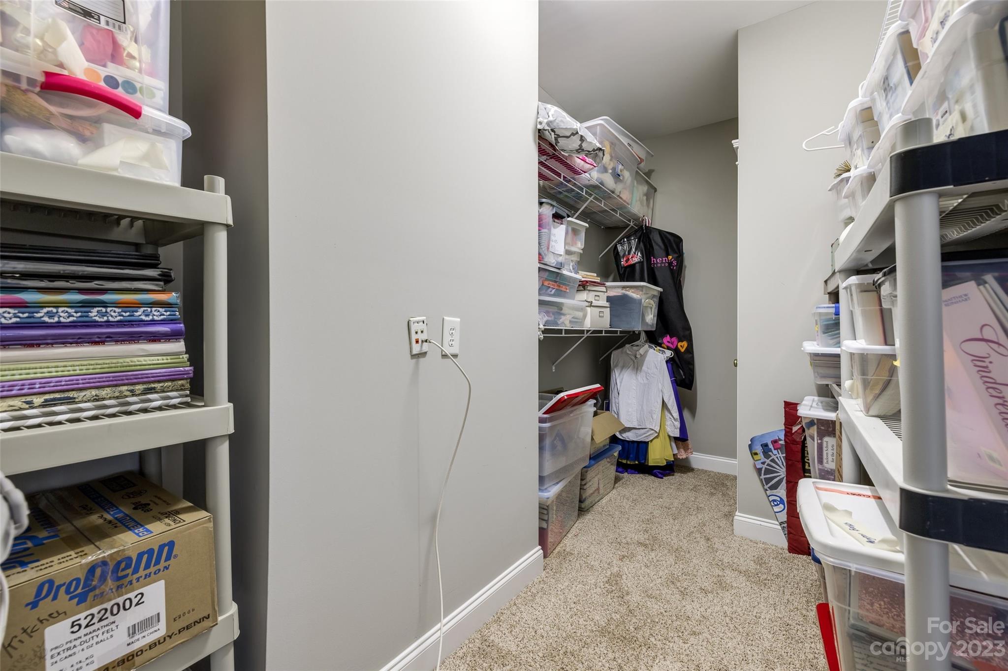 3292 Richard's Crossing Fort Mill, SC 29708 - Photo 32 of 39 a view of walk in closet with clothes and shoes