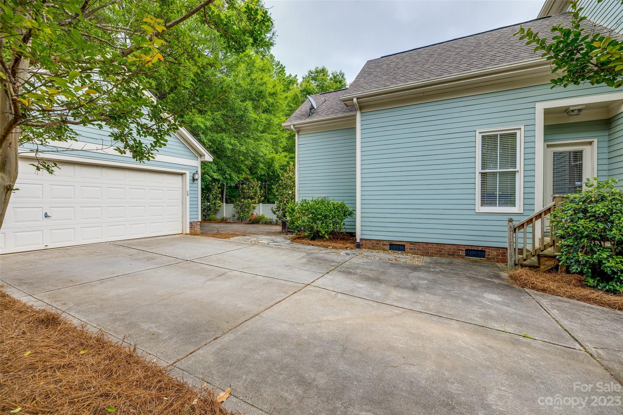3292 Richard's Crossing Fort Mill, SC 29708 - Photo 34 of 39 a view of backyard and garage