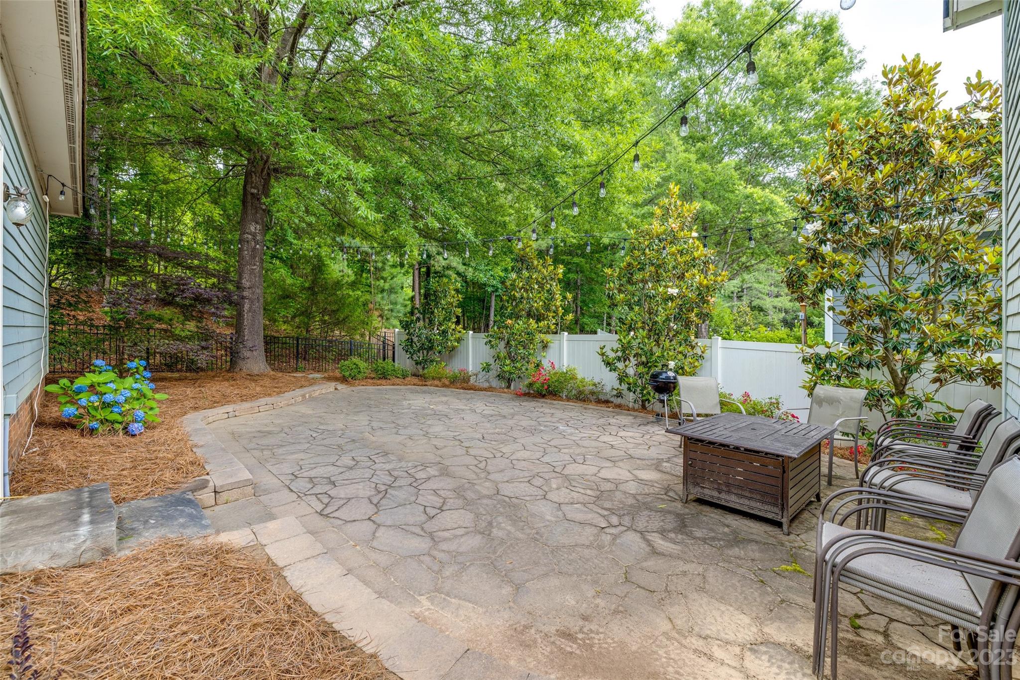 3292 Richard's Crossing Fort Mill, SC 29708 - Photo 35 of 39 a backyard of a house with outdoor seating