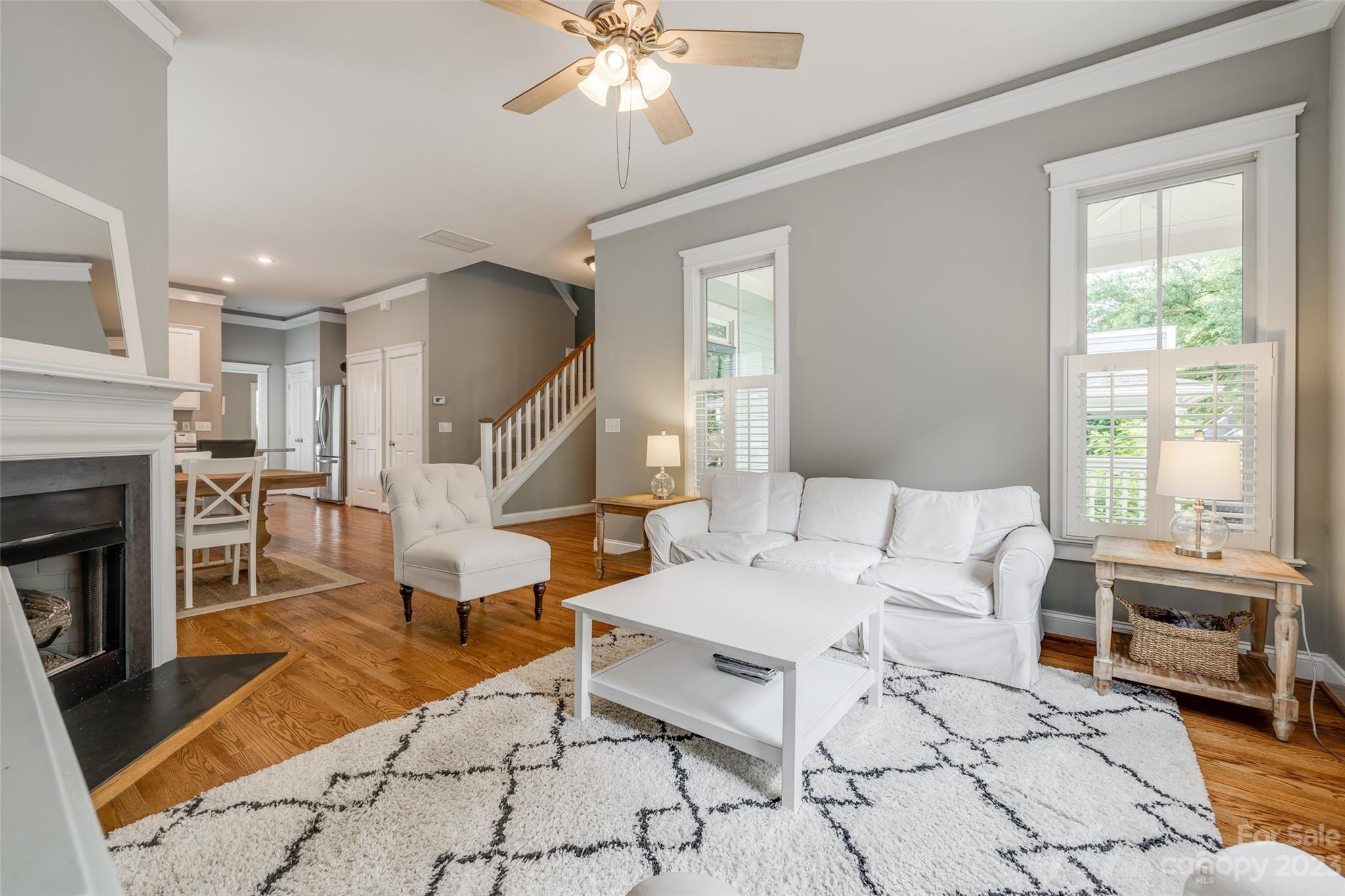 3292 Richard's Crossing Fort Mill, SC 29708 - Photo 10 of 39 a living room with furniture a table and kitchen view