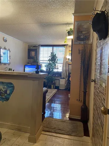 a kitchen with a refrigerator and a stove