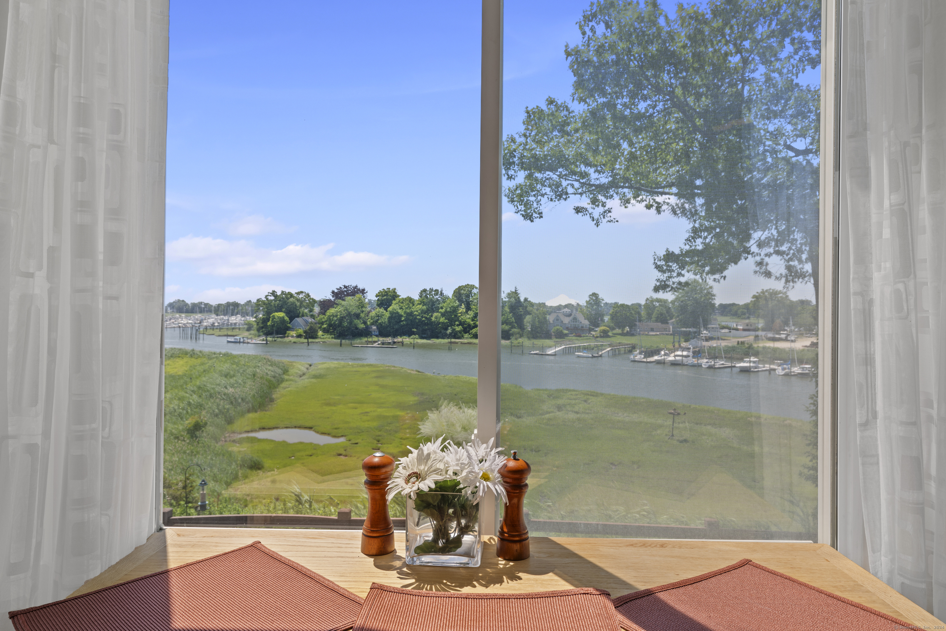 65 Quarry Dock Road, Unit 65 Branford, CT 06405 - Photo 1 of 1 Imagine watching boat activity while having morning coffeee from your eat in kitchen area.
