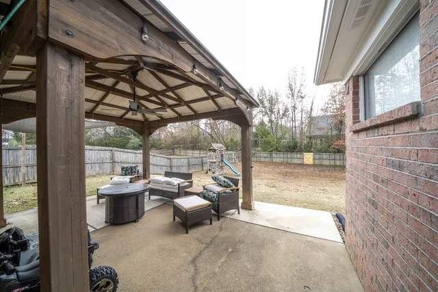 a view of a backyard of a house