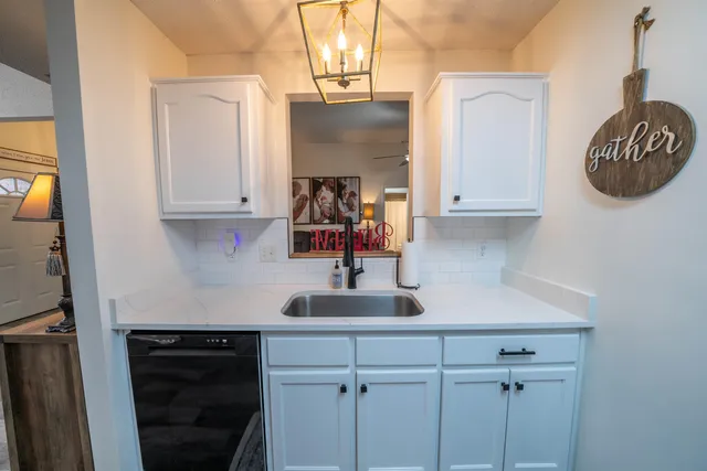 a very nice looking room with a wooden floor and furniture