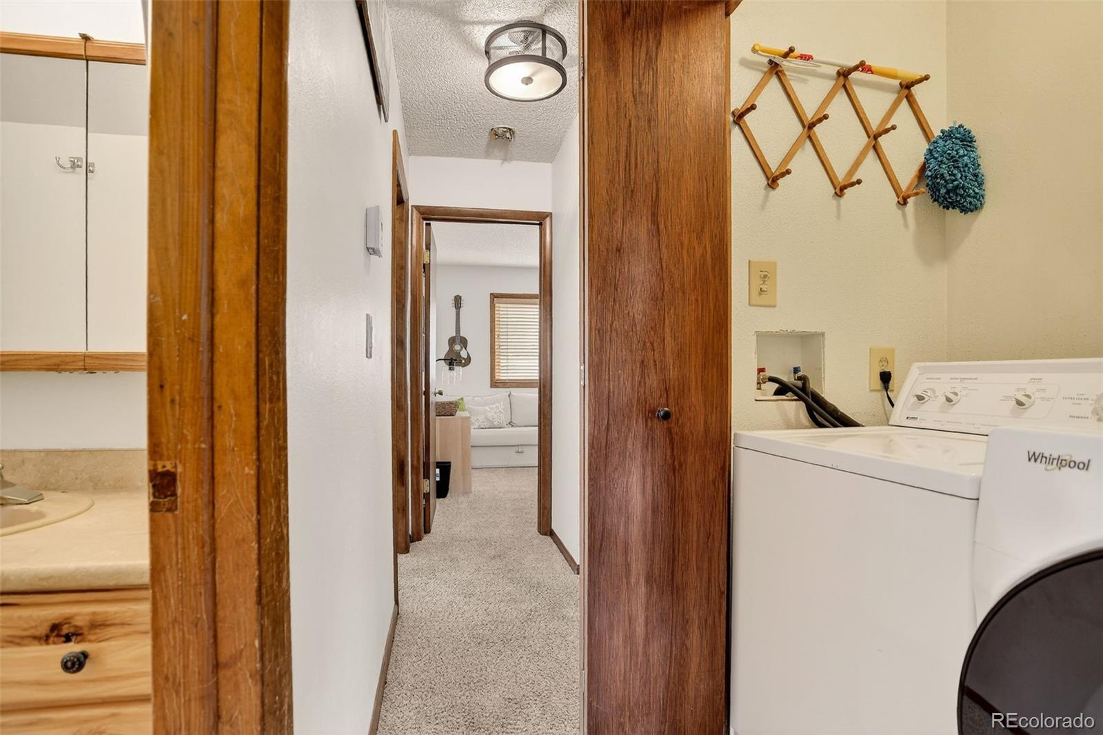 300 Sterling Way, Unit 2 Fraser, CO 80442 - Photo 16 of 28 a view of storage and utility room with utility room