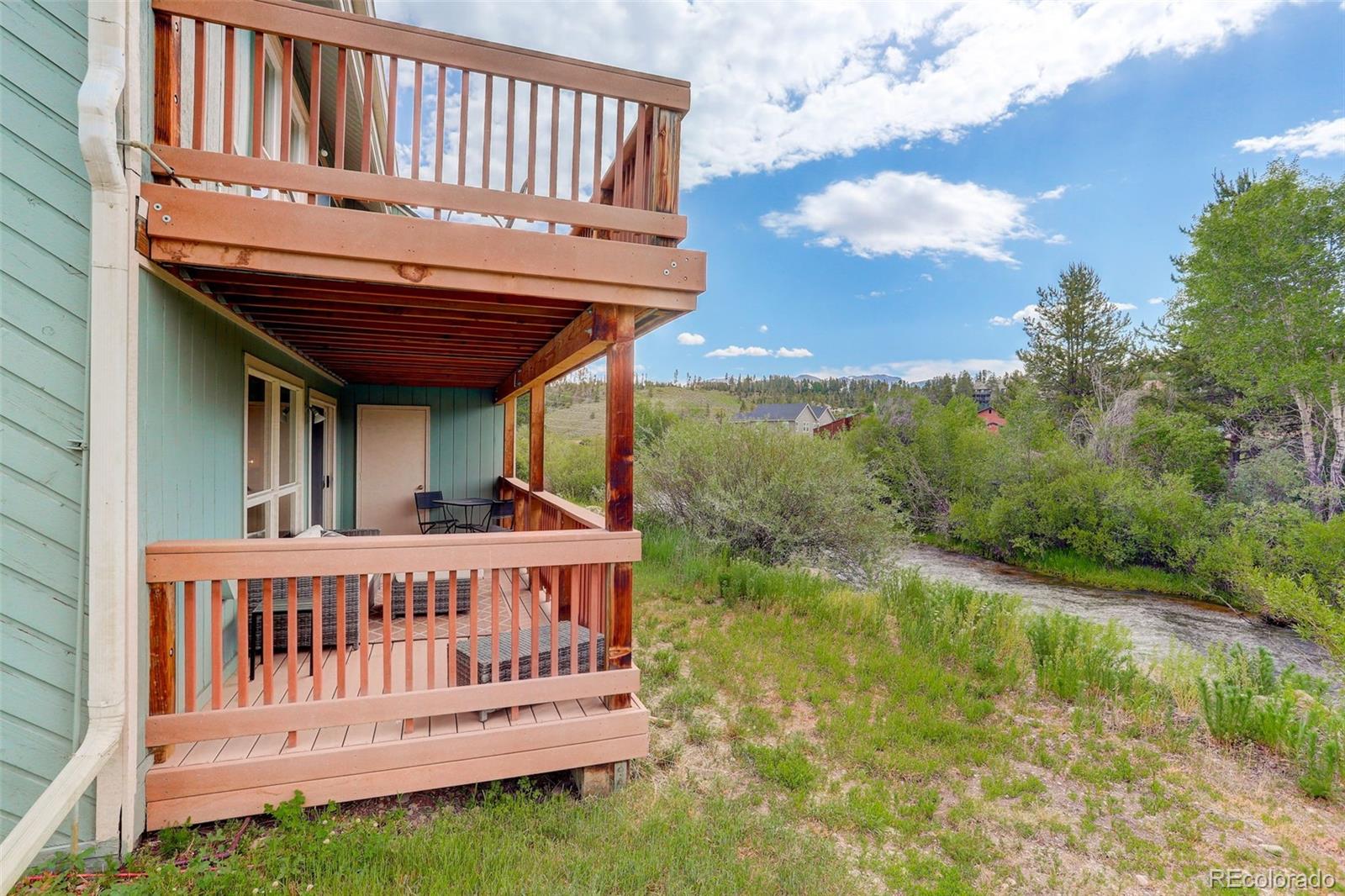 300 Sterling Way, Unit 2 Fraser, CO 80442 - Photo 2 of 28 a view of a house with pool and deck
