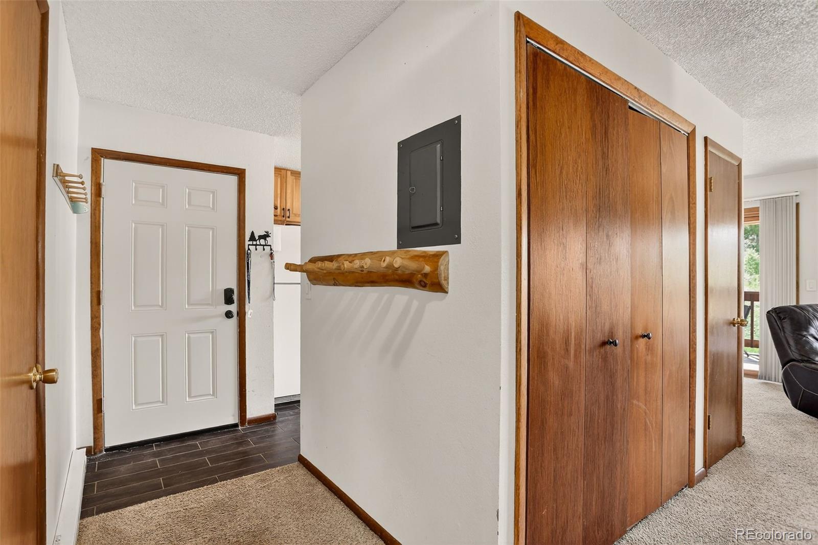 300 Sterling Way, Unit 2 Fraser, CO 80442 - Photo 6 of 28 a view of a hallway with wooden floor