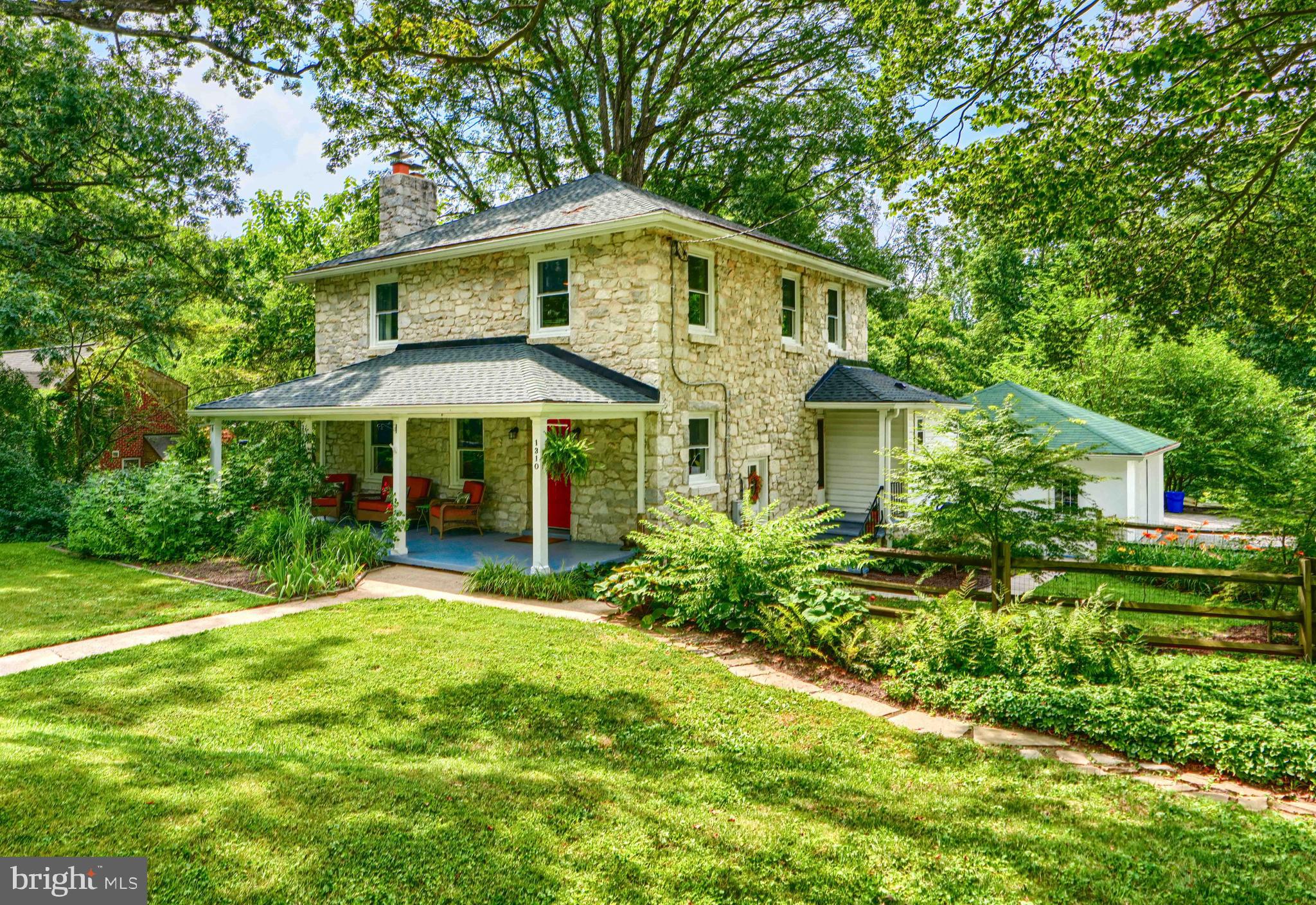 1310 Providence Road Baltimore, MD 21286 - Photo 1 of 31 a front view of house with yard and green space