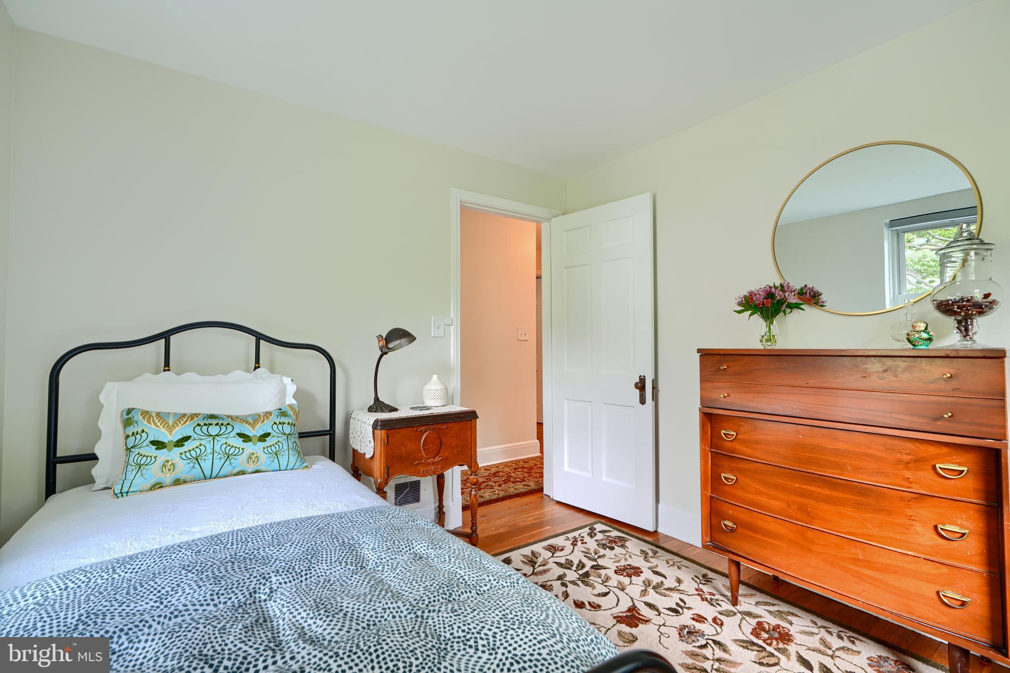 1310 Providence Road Baltimore, MD 21286 - Photo 15 of 31 a bedroom with a bed and a dresser