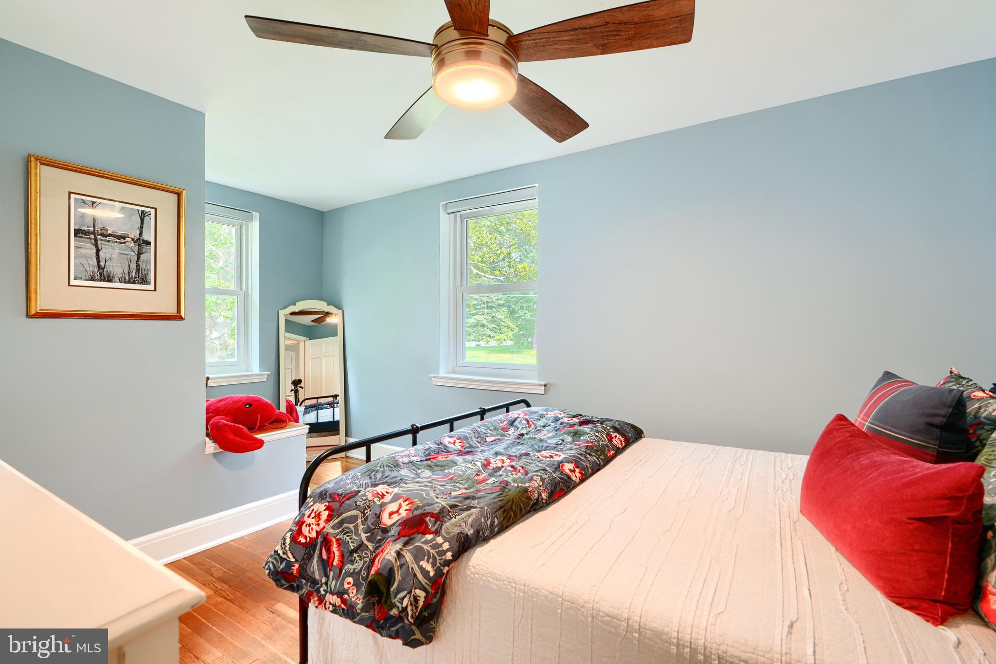 1310 Providence Road Baltimore, MD 21286 - Photo 18 of 31 a bedroom with a bed and a painting on the wall
