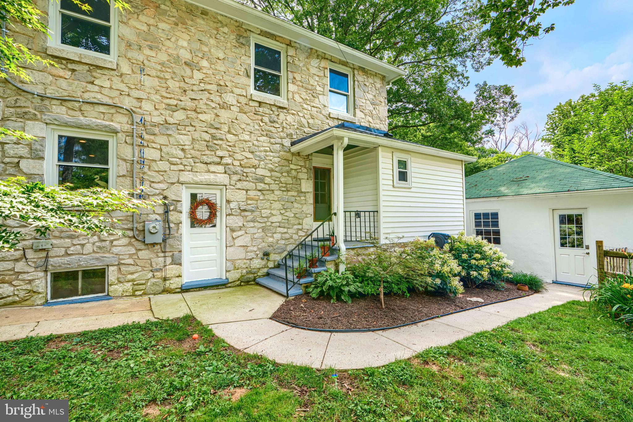 1310 Providence Road Baltimore, MD 21286 - Photo 30 of 31 a front view of a house with garden