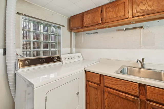 a utility room with dryer and washer