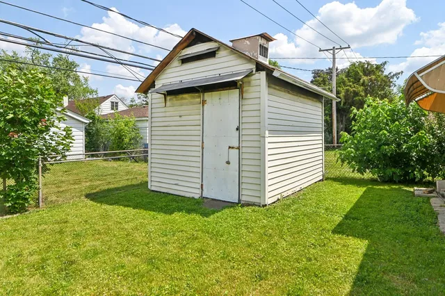 a view of a back yard of the house