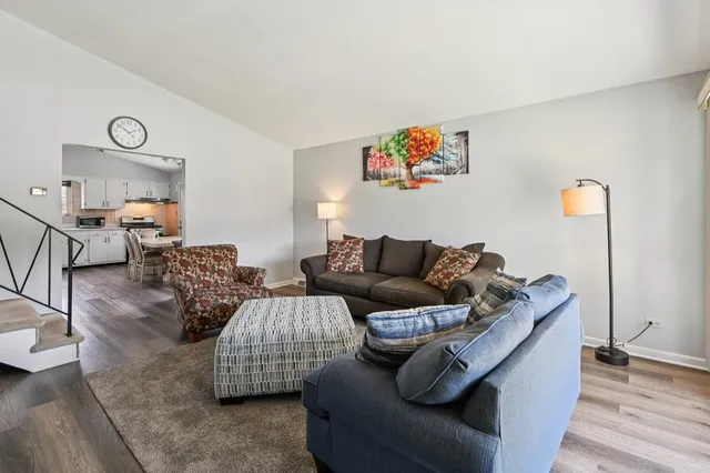 a living room with furniture and a couch