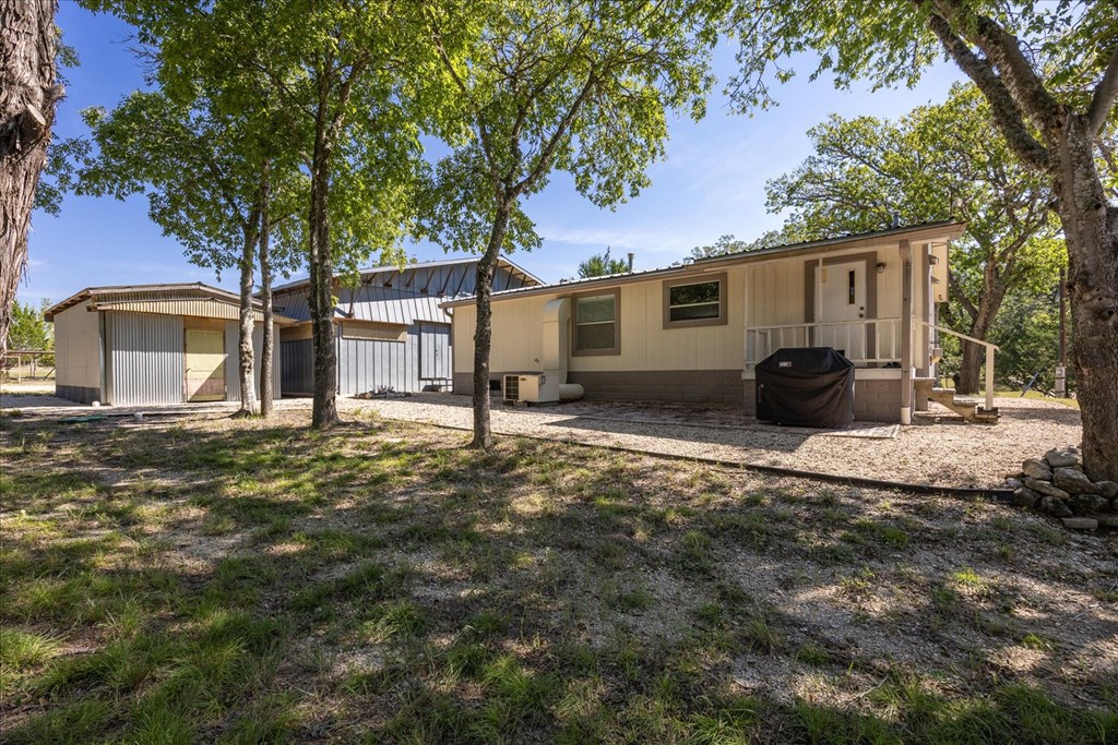 363 Elm Pass 2 Center Point, TX 78010 - Photo 30 of 60 a view of a house with backyard